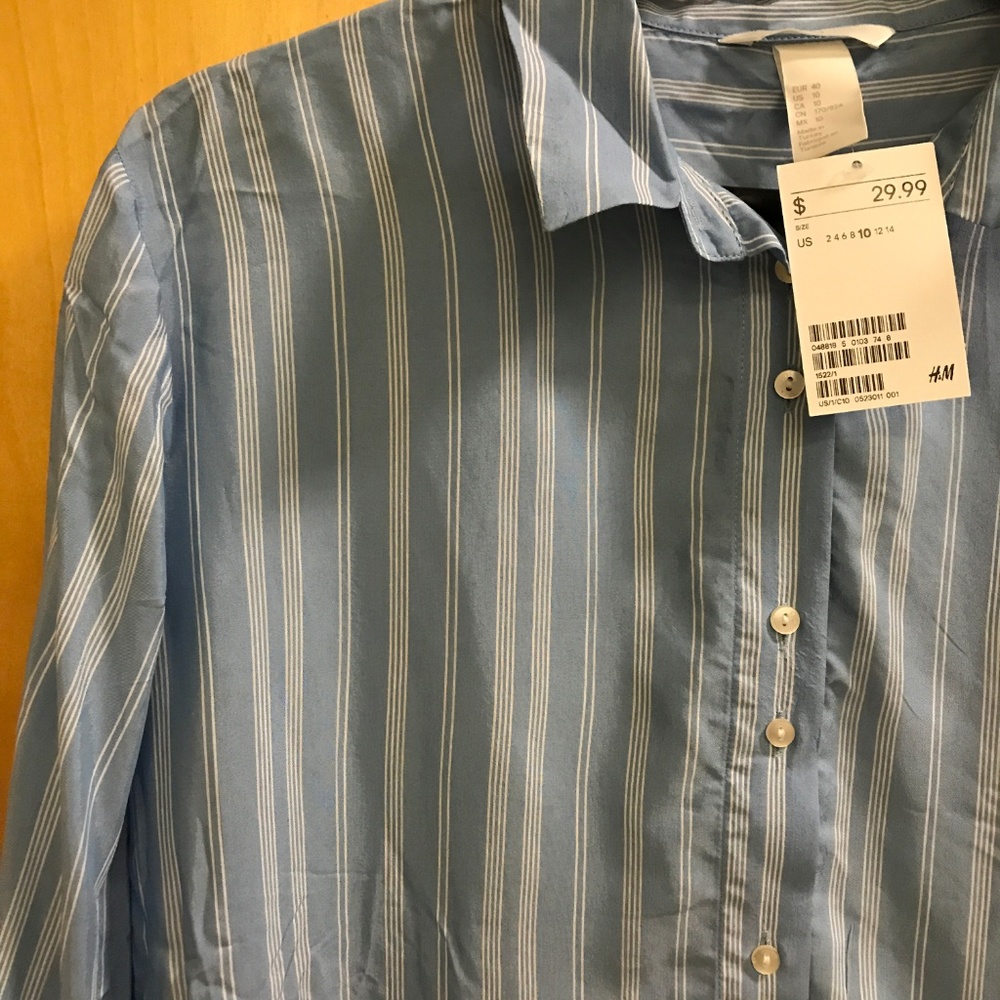 Blue vertical striped flowy button down shirt